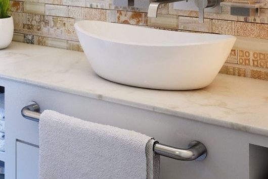 Powder room renovation in Nepean with vessel sink vanity