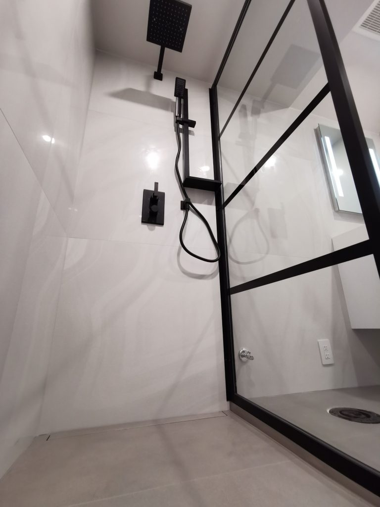 washroom remodeling with black shower accessories -washroom renovation ideas