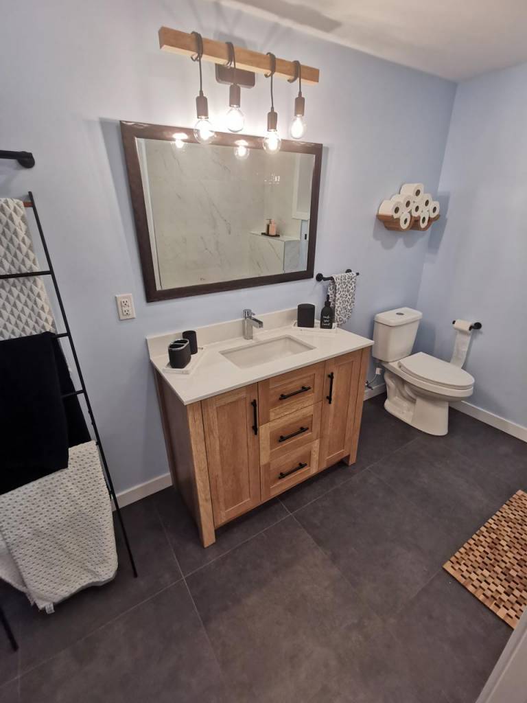 Compact floating vanity in an Ottawa powder room remodel